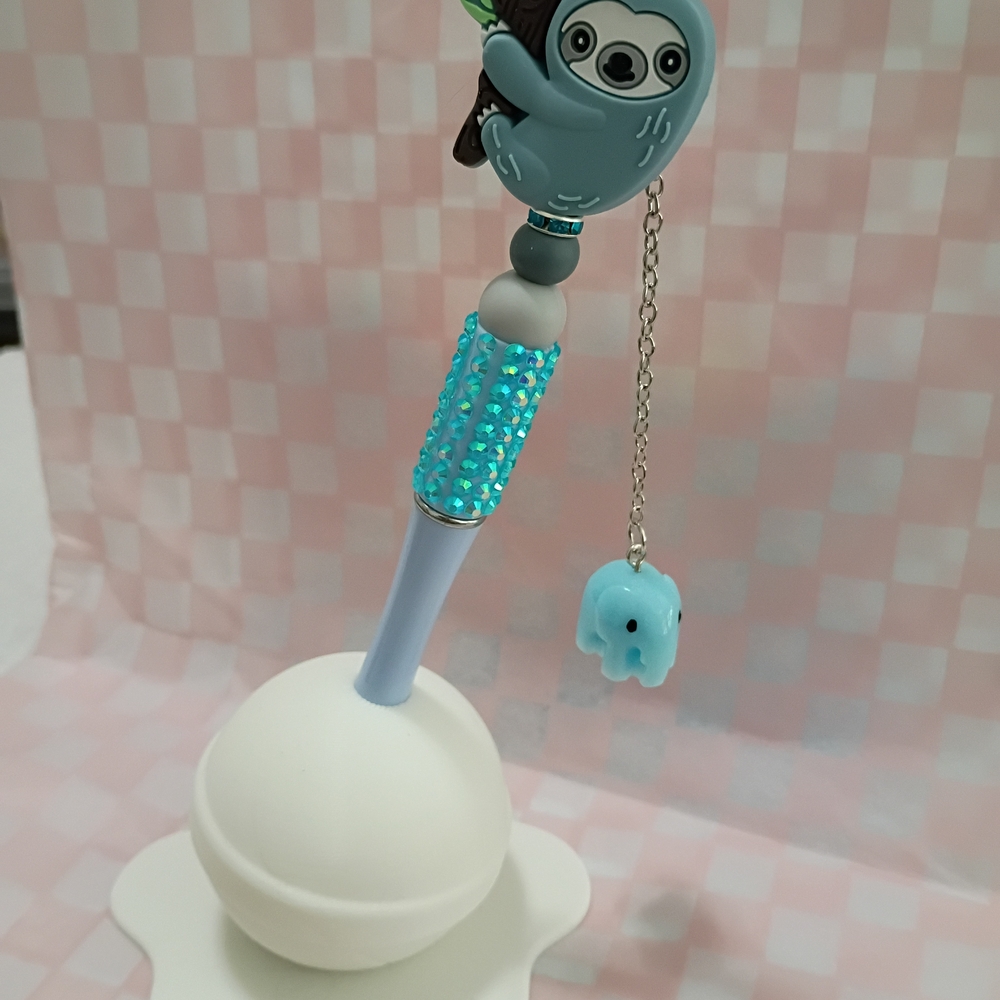 Blue Sloth Pen with Hanging Elephant